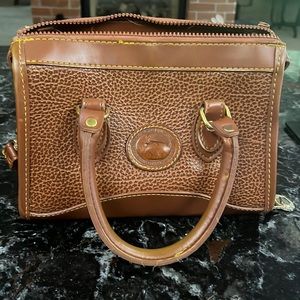 Vintage Dooney & Burke tan leather handbag.